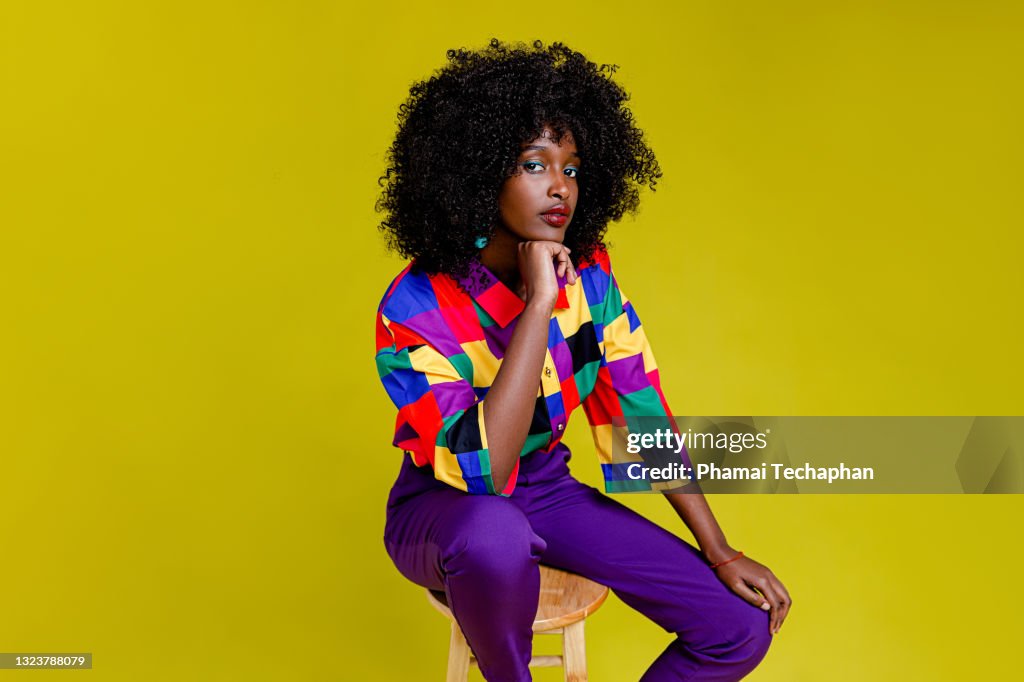 Fashionable woman in colorful shirt