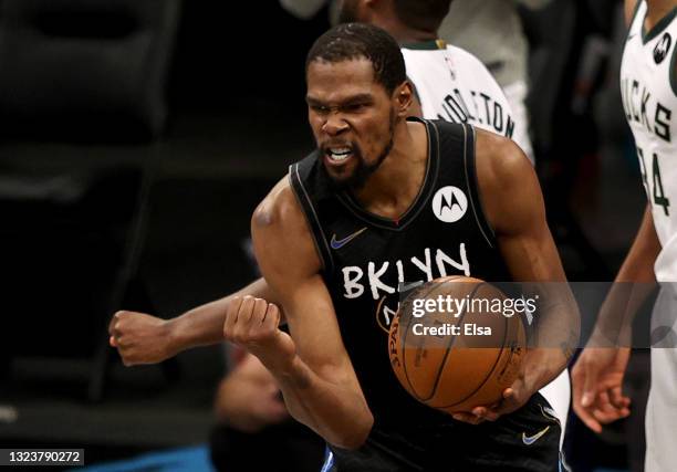 Kevin Durant of the Brooklyn Nets celebrates after he is fouled late in the fourth quarter against the Milwaukee Bucks during game 5 of the Eastern...