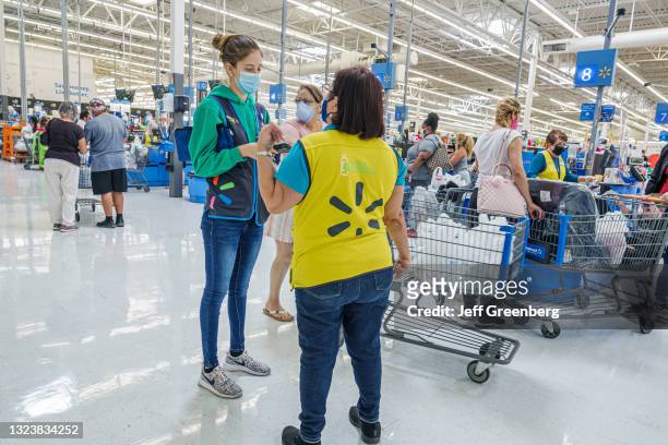Florida, Miami, Walmart discount department store, check out lines.