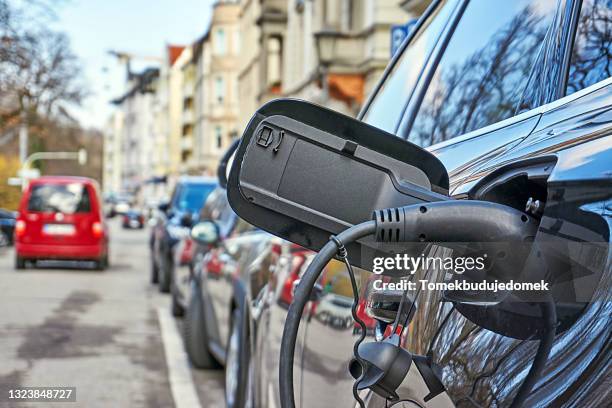 refueling - hybrid car stock pictures, royalty-free photos & images