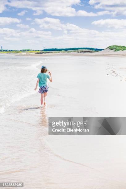 beach walk - next i moran stock pictures, royalty-free photos & images