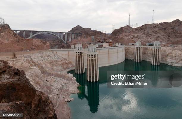 The Arizona Intake Towers and Nevada Intake Towers on the upstream side of the Hoover Dam are shown on June 15, 2021 in the Lake Mead National...