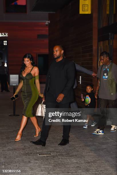 Travis Scott, Kylie Jenner and daughter Stormi Webster seen out in Manhattan on June 15, 2021 in New York City.