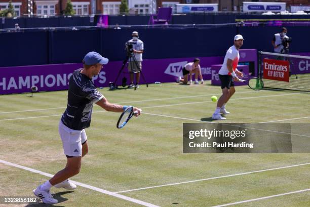 Dominic Inglot of Great Britain, playing partner of Luke Bambridge of Great Britain plays a forehand during there Round of 16 match against Juan...