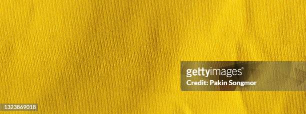 yellow fabric cloth polyester texture and textile background. - stiff stock-fotos und bilder