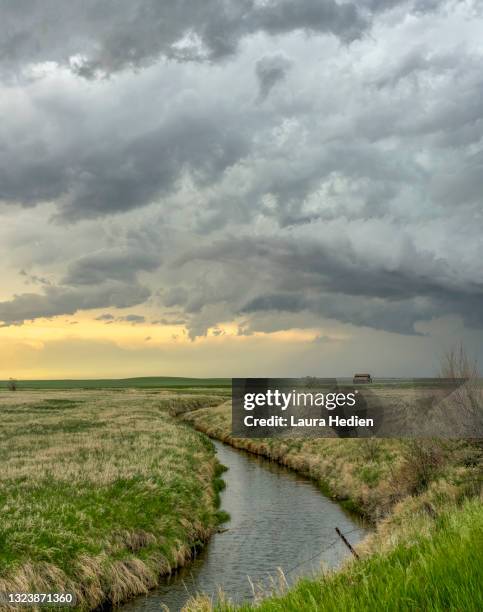 storms on the great plains with creek - supercell stock pictures, royalty-free photos & images
