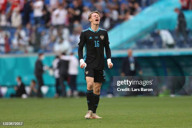 Matvei Safonov of Russia celebrates after their side's first goal scored by Aleksei Miranchuk during the UEFA Euro 2020 Championship Group B match...