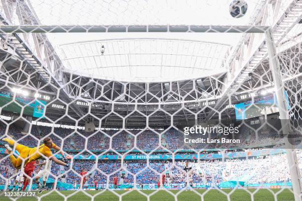 Lukas Hradecky of Finland fails to save Russia's first goal scored by Aleksei Miranchuk during the UEFA Euro 2020 Championship Group B match between...