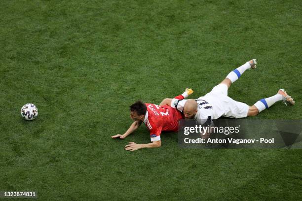 Teemu Pukki of Finland is challenged by Aleksandr Golovin of Russia during the UEFA Euro 2020 Championship Group B match between Finland and Russia...