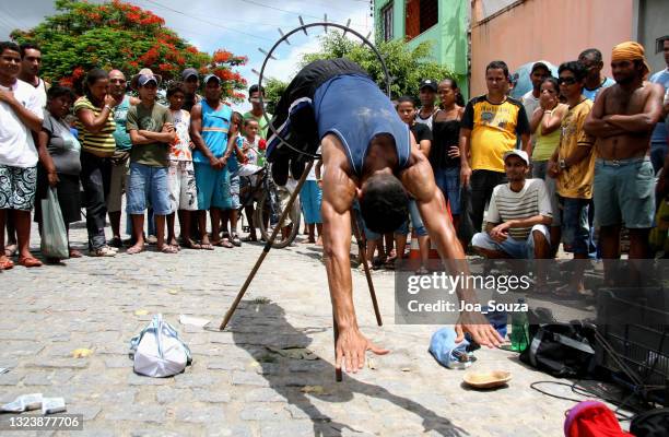 jumper between sharp knives - street artist stock pictures, royalty-free photos & images