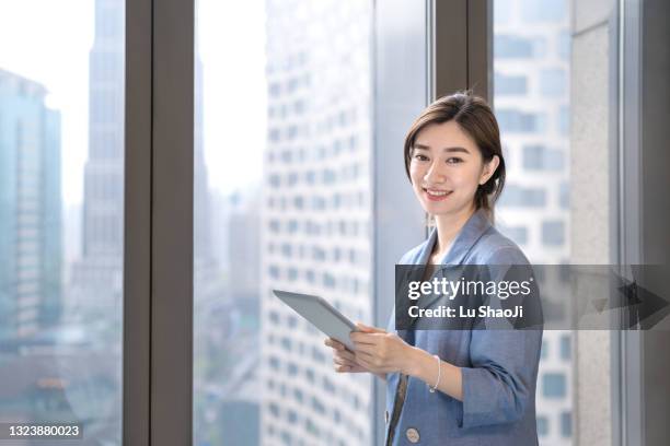 portrait of confident asian business women in the office - asia woman stock pictures, royalty-free photos & images