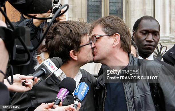 Charlie Hebdo cartoonist Luz kisses Charlie Hebdo publisher and cartoonist Charb during a support rally for French satirical magazine Charlie Hebdo,...