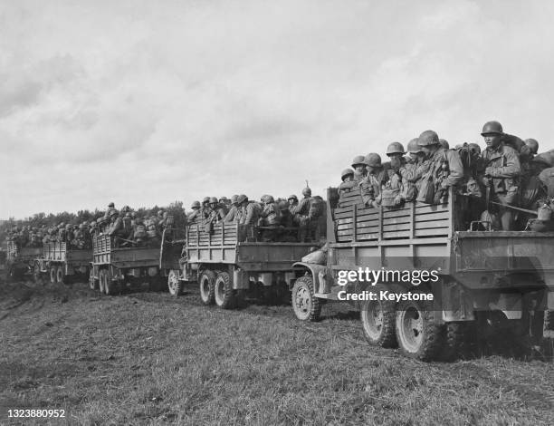 Japanese American infantrymen of the US 442nd Regimental Combat Team from United States Seventh Army, a unit composed almost entirely of...