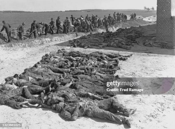 German citizens from the nearby town of Gardelegen are made to bury the bodies into mass graves of prisoners massacred by the local Volkssturm,...