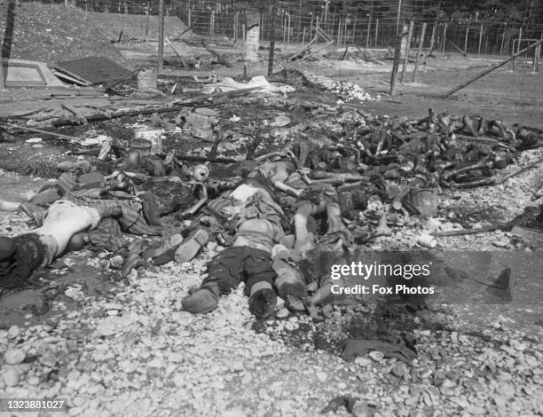 Scenes inside the Kaufering subcamp of the Dachau Nazi Concentration Camp of the dead and charred bodies of prisoners executed by their SS...