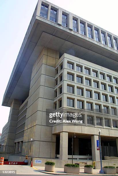 The FBI headquarters building is seen June 20, 2001 in Washington, D. C. An FBI security expert who had access to informant identities and witness...