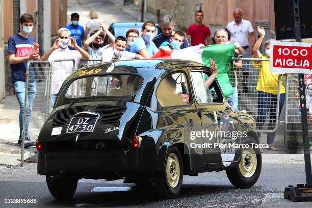 Alan Bilanin and Susan Zolla in a FIAT 600 of 1956 during the Mille Miglia Historical Race on June 16, 2021 in Brescia, Italy.