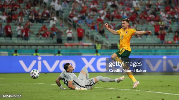 Aaron Ramsey of Wales scores their side's first goal past Ugurcan Cakir of Turkey during the UEFA Euro 2020 Championship Group A match between Turkey...