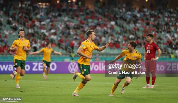 Aaron Ramsey of Wales celebrates with Daniel James after scoring their side's first goal during the UEFA Euro 2020 Championship Group A match between...