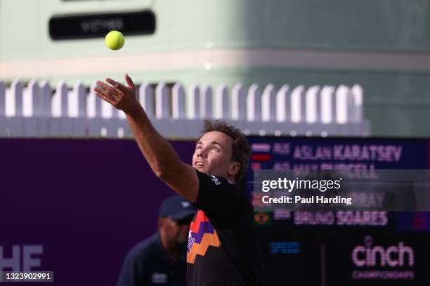 Bruno Soares of Brazil, playing partner of Jamie Murray of Great Britain serves during there Round of 16 match against Aslan Karatsev of Russia and...