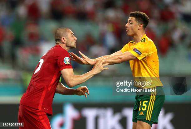 Burak Yilmaz of Turkey clashes with Ethan Ampadu of Wales during the UEFA Euro 2020 Championship Group A match between Turkey and Wales at Baku...