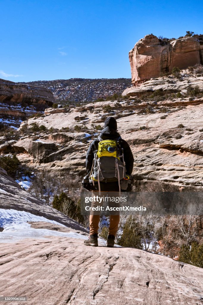 Spring Hike Man Young Man Hikes Along Sandstone Cliffs In Springtime High-Res Stock ...
