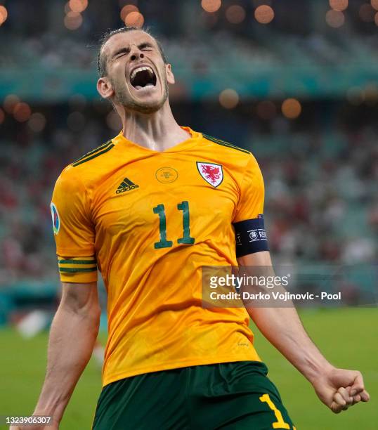 Gareth Bale of Wales celebrates after their side's second goal scored by Connor Roberts during the UEFA Euro 2020 Championship Group A match between...