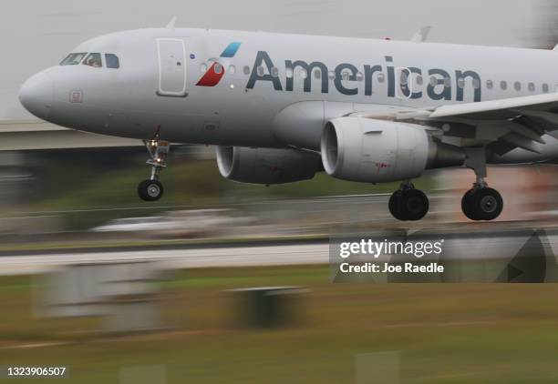 An American Airlines plane lands at the Miami International Airport on June 16, 2021 in Miami, Florida. Miami International Airport, founded in 1928,...