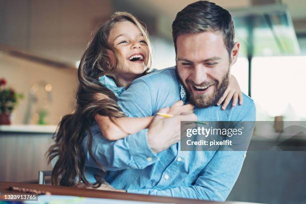 father and daughter having fun at home - father daughter stock pictures, royalty-free photos & images