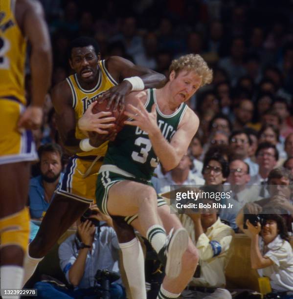 Los Angeles Lakers Bob McAdoo battles Boston Celtics Larry Bird for ball during 1985 NBA Finals between Los Angeles Lakers and Boston Celtics, June...