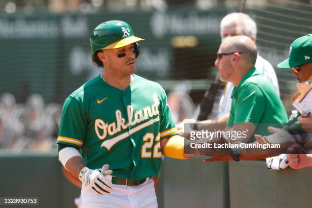 Ramon Laureano of the Oakland Athletics celebrates with teammates after hitting a solo home run in the bottom of the fourth inning against the Los...