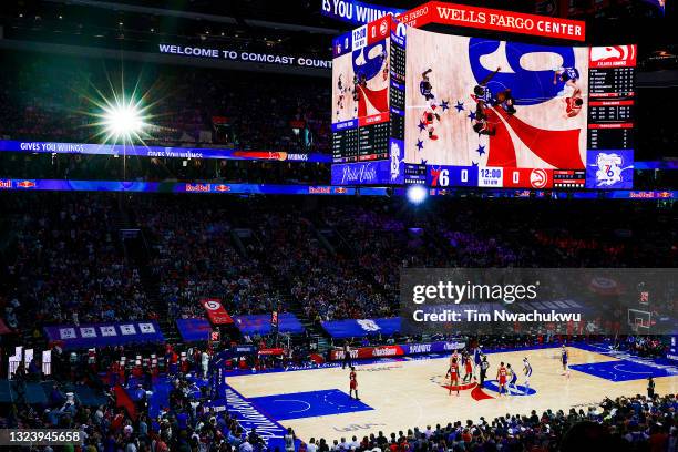The Philadelphia 76ers and Atlanta Hawks tip off during Game Five of the Eastern Conference Semifinals at Wells Fargo Center on June 16, 2021 in...