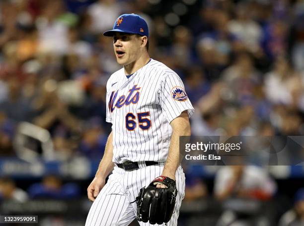 Trevor May of the New York Mets celebrates the last out of the eighth inning against the Chicago Cubs at Citi Field on June 16, 2021 in the Flushing...