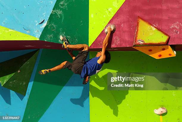 Hafzanizam Bakhori of Malaysia competes in the Mens Sport Climbing on day two of the 2011 Southeast Asian Games at Jakabaring Sports Complex on...