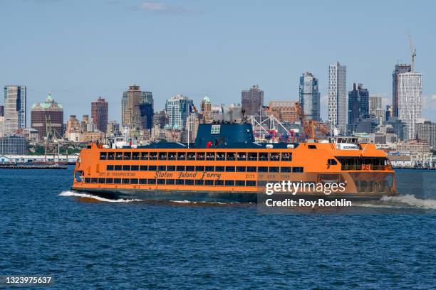 View of a Staten Island Ferry as seen from another Staten Island Ferry on June 16, 2021 in New York City.