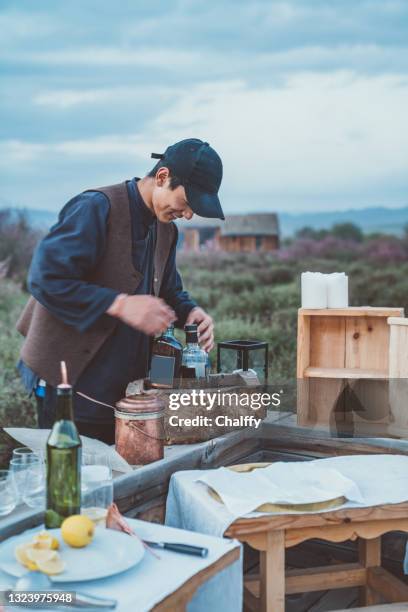 glamping at grassland - fancy outdoor fireplace stock pictures, royalty-free photos & images
