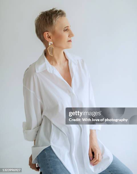 mature adult european beautiful woman with short haircut front view - mature female models stock pictures, royalty-free photos & images