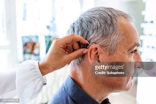 you'll have to speak up - human ear stockfoto's en -beelden