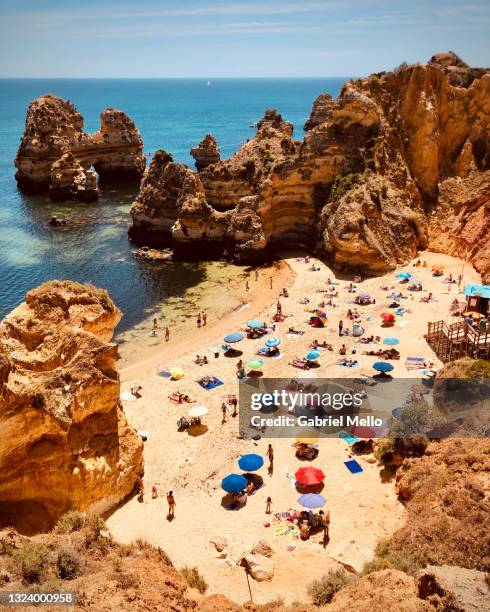 camilo beach in lagos - albufeira beach stockfoto's en -beelden