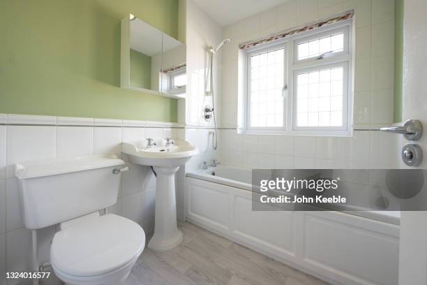 property interiors - bathroom cabinet stock pictures, royalty-free photos & images