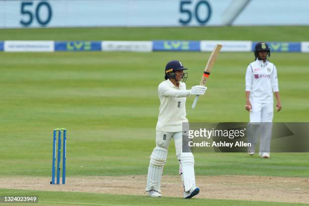 Sophia Dunkley of England reaches 50 during her Test debut on Day Two of the LV= Insurance Test Match between England Women and India Women at...