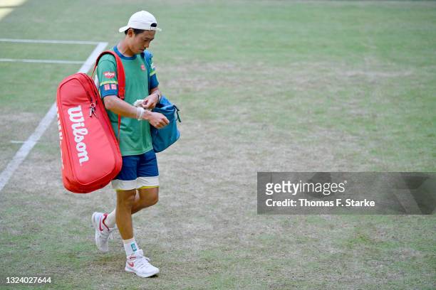 Kei Nishikori of Japan leaves the Center Court after losing his match against Sebastian Korda of the United States during day 6 of the Noventi Open...