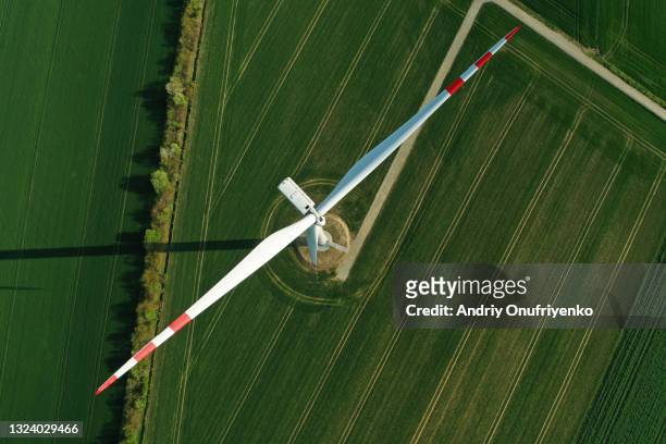 aerial view of wind turbine - farming technology stockfoto's en -beelden