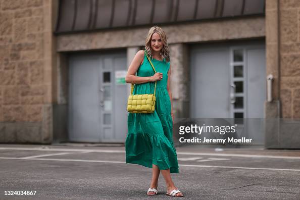 Louisa Theresa Grass wearing green Zero Fashion midi dress, yellow ...