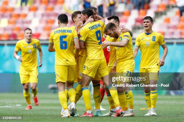 Roman Yaremchuk of Ukraine celebrates with team mates after scoring their side's second goal during the UEFA Euro 2020 Championship Group C match...