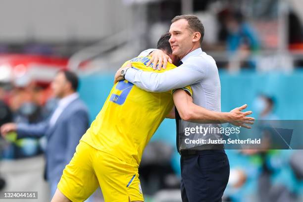 Roman Yaremchuk of Ukraine celebrates with Andriy Shevchenko, Head Coach of Ukraine after scoring their side's second goal during the UEFA Euro 2020...