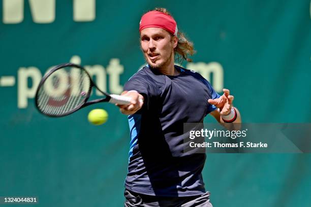 Lukas Lacko of Slovakia plays a forehand in his match against Lloyd Harris of South Africa during day 6 of the Noventi Open at OWL-Arena on June 17,...