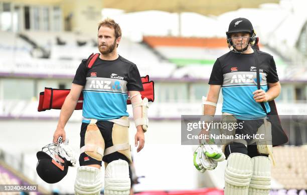 Kane Williamson and Tom Latham of New Zealand make their way to a net session at The Ageas Bowl on June 17, 2021 in Southampton, England.