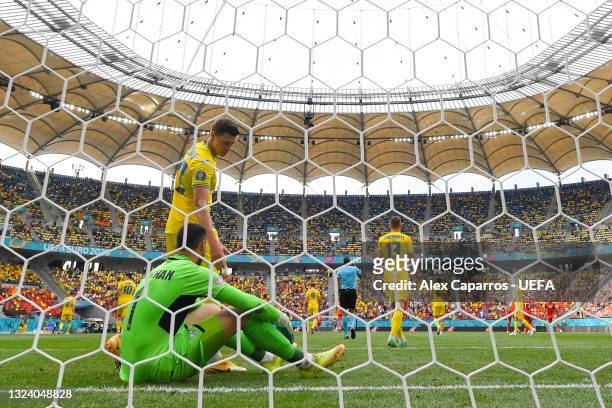 Georgiy Bushchan of Ukraine looks dejected after North Macedonia's first goal scored by Egzijan Alioski of North Macedonia during the UEFA Euro 2020...