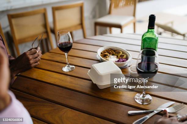 wine and healthy food ordered via app - wine home delivery stock pictures, royalty-free photos & images